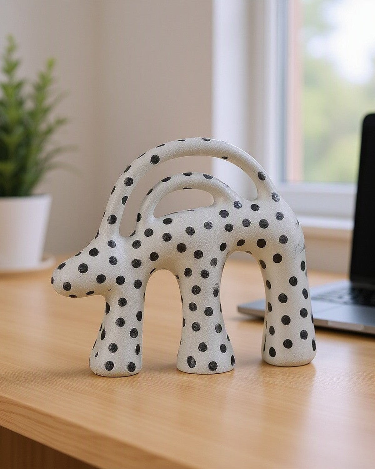 Dot Aggregation Ceramic Sculpture on a desk