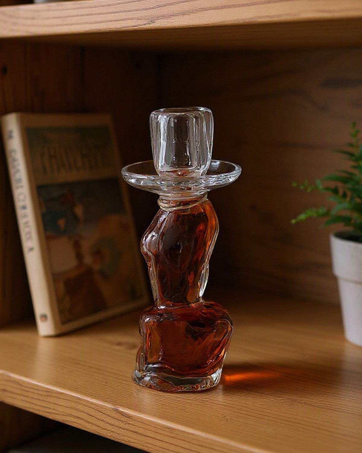 Shadow Handmade Glass Candle Holder on a shelf