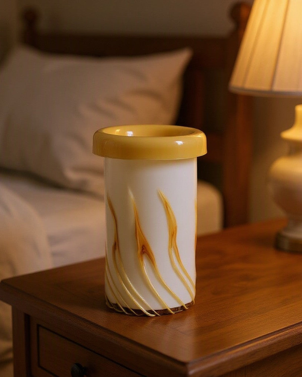 Curled Mouth Yellow-Striped Vase styled in a bedroom