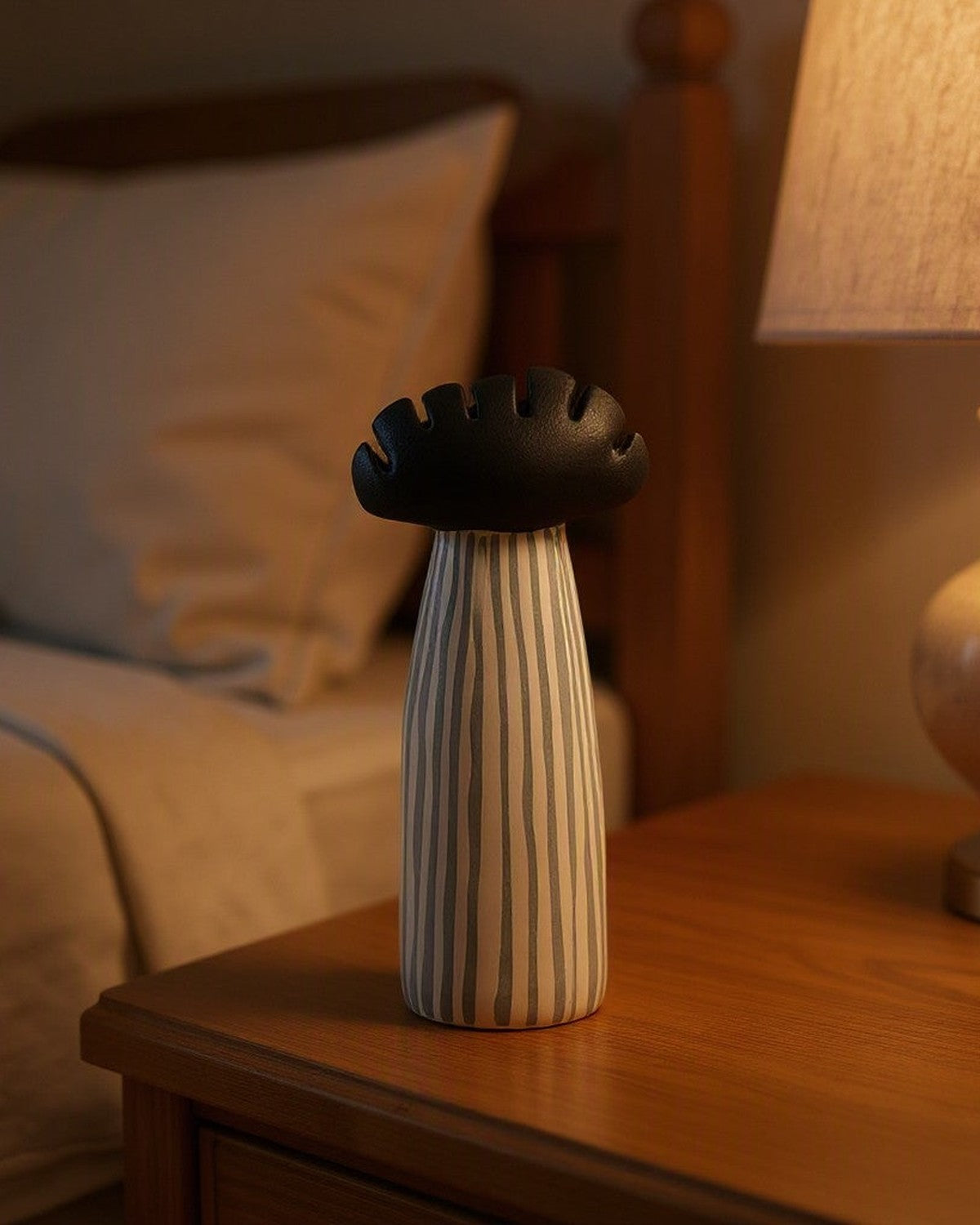 Hand-Painted Mushroom Ceramic Sculpture styled in a bedroom