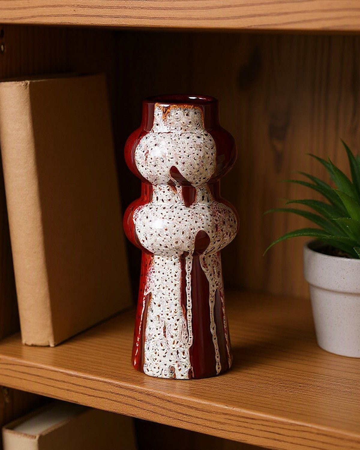 Colorful Splashed Glaze Ceramic Vase on a shelf