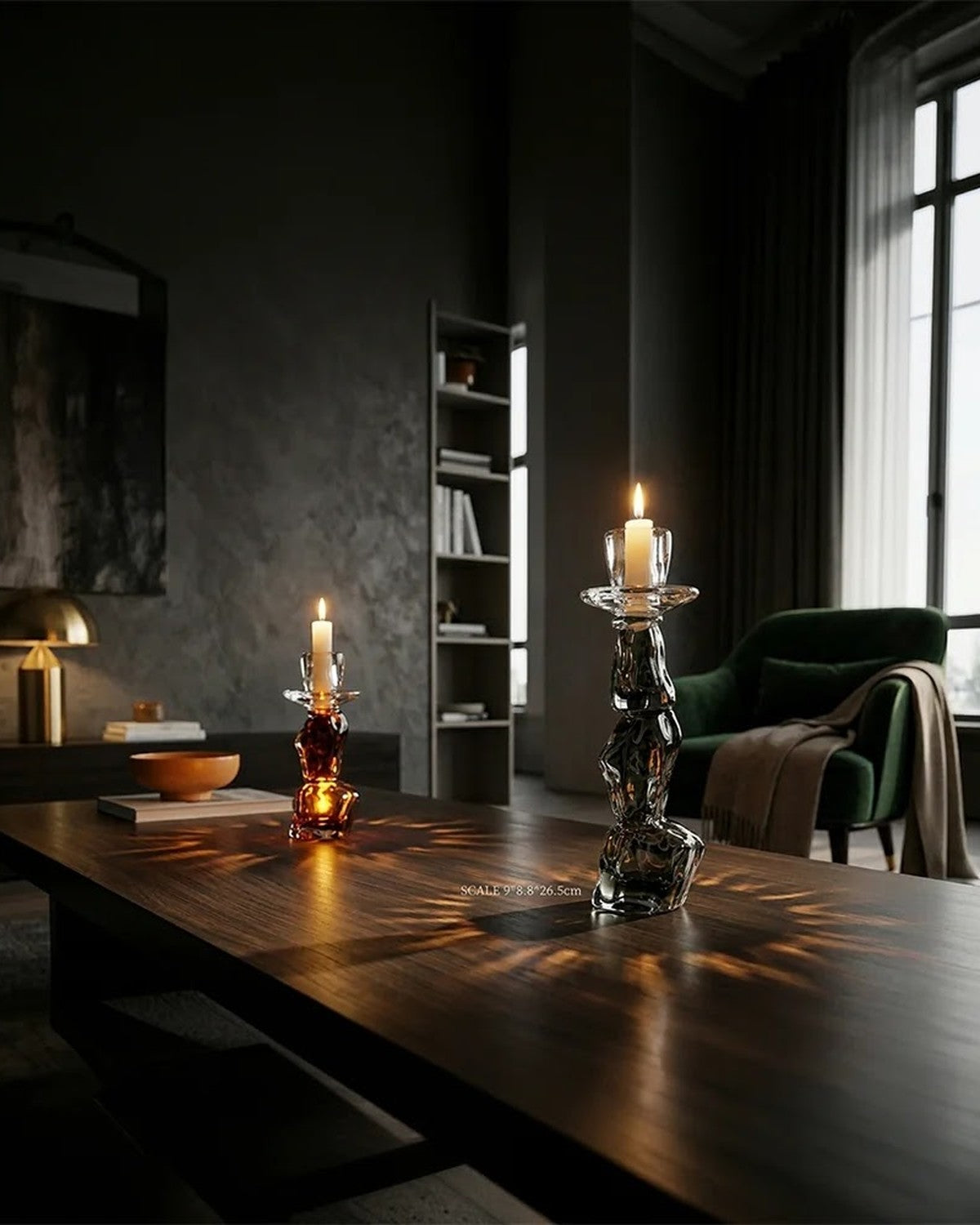 In a living room: Two irregular candle holders with lit candles on a dark table