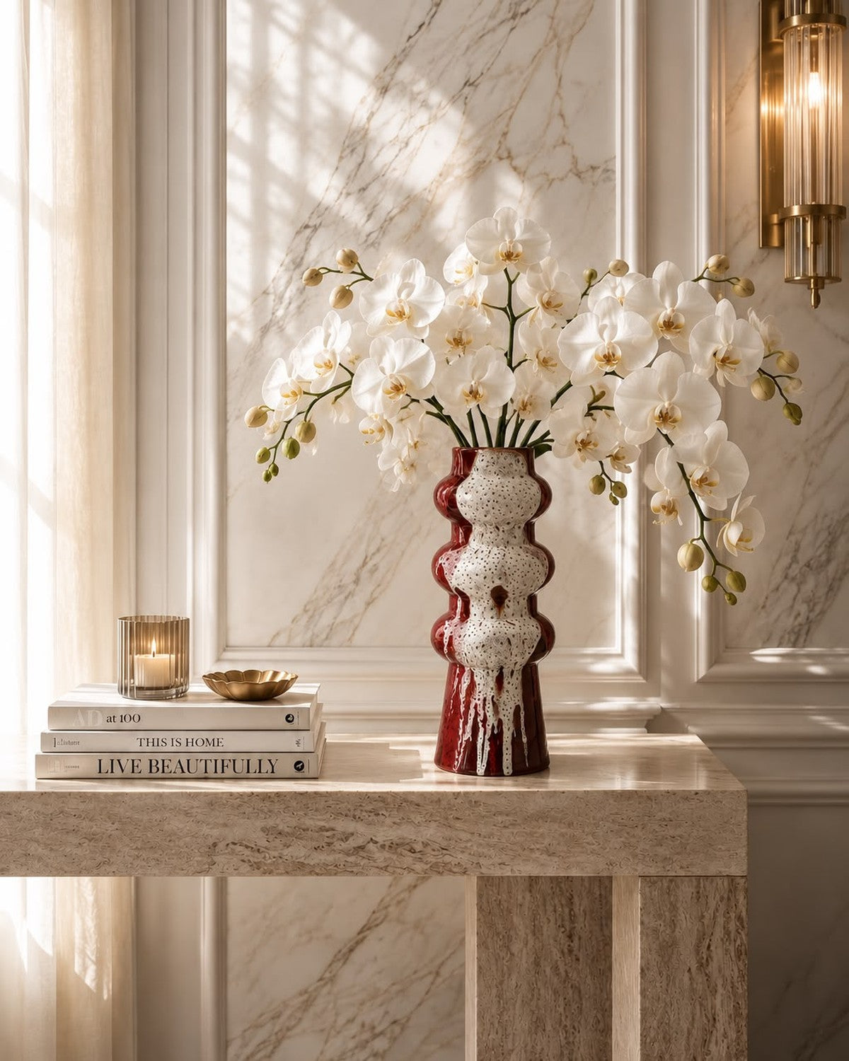 orchids, books, and a candle